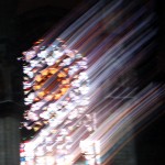 Light shining through a stained glass window